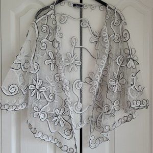 Cardigan with floral details